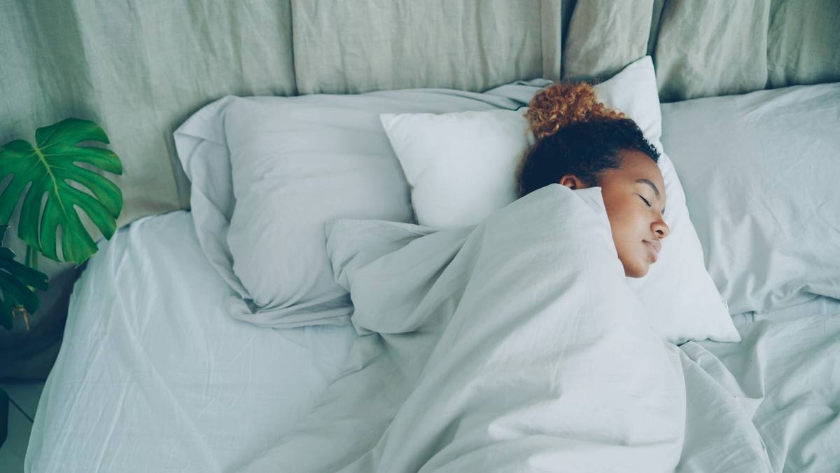 Close-up of satin sleep wrap showing smooth texture and secure tie